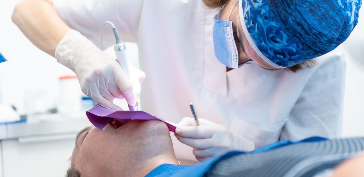 Dentist performing root canal procedure on a patient in Grants Pass
