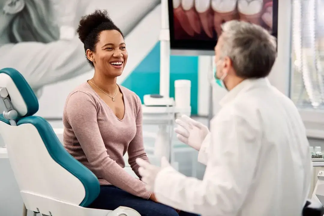 dentist-explaining-preventative-dental-care-auburn-al-to-patient