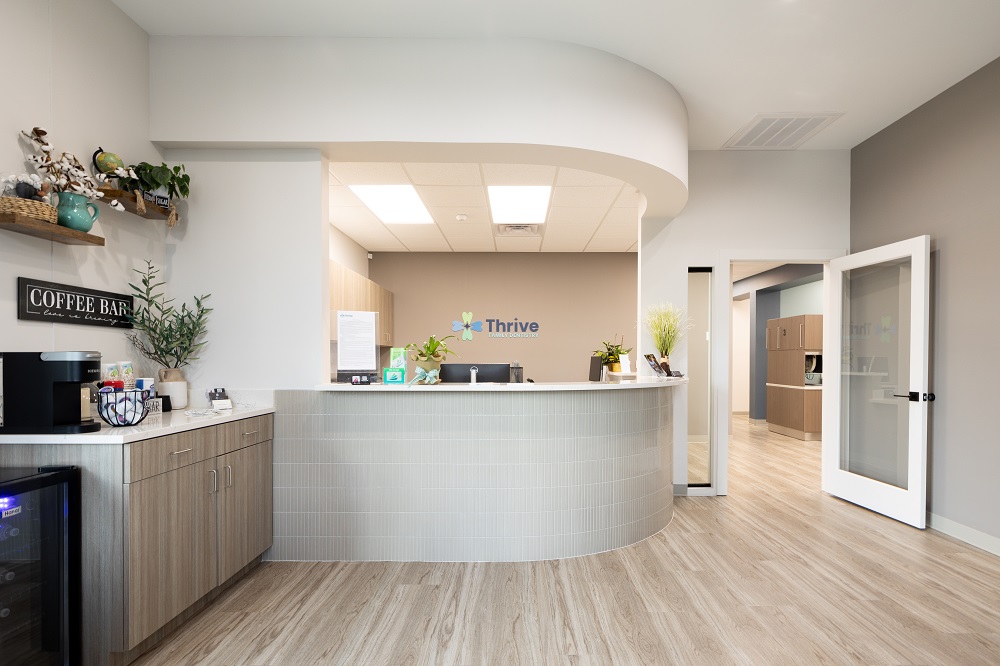 Welcoming reception desk at Thrive Family Dentistry of Auburn AL