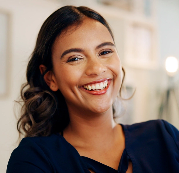 A happy patient looking pretty after cosmetic dentistry treatment in Phoenix